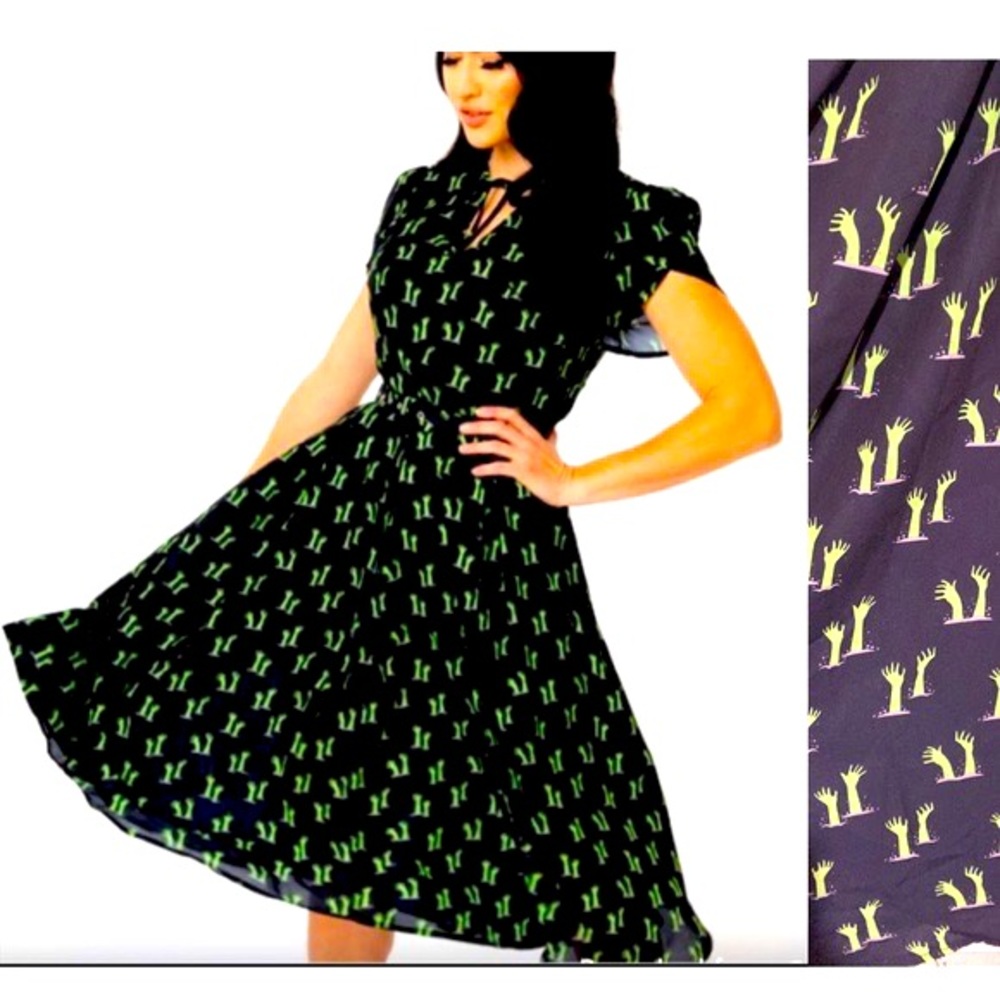 Unique vintage zombie hands dress in medium. Black and green comes with belt